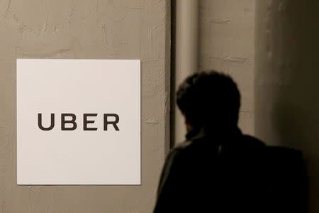 FILE PHOTO: A man arrives at the Uber offices in Queens, New York, U.S. on February 2, 2017. REUTERS/Brendan McDermid/File Photo