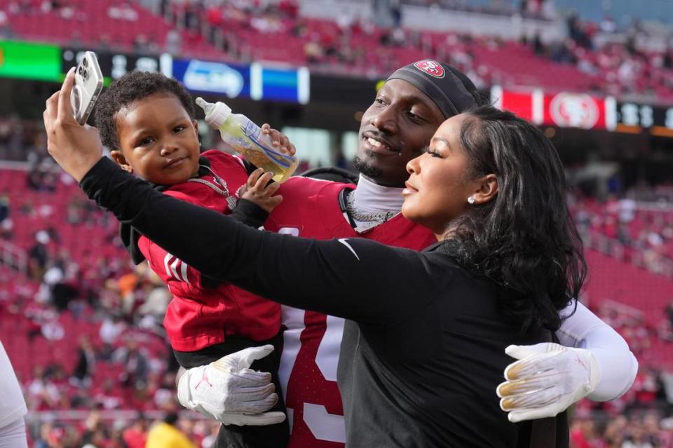 San Francisco 49ers wide receiver Deebo Samuel takes a selfie with his son, Tyshun, and girlfriend, Mahogany Jones, before the Seattle Seahawks game in December. Darren Yamashita/USA TODAY NETWORK