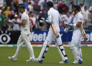 Australia's Mitchell Johnson (L) argues with England's Stuart Broad (C) and Matt Prior at the end of the fourth day's play in the second Ashes cricket test at the Adelaide Oval December 8, 2013. REUTERS/David Gray (AUSTRALIA - Tags: SPORT CRICKET)