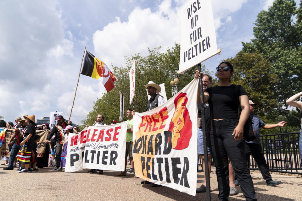 People gather for a rally outside of the White House in support of imprisoned Native American activist Leonard Peltier, Tuesday, Sept. 12, 2023, in Washington. (AP Photo/Stephanie Scarbrough)