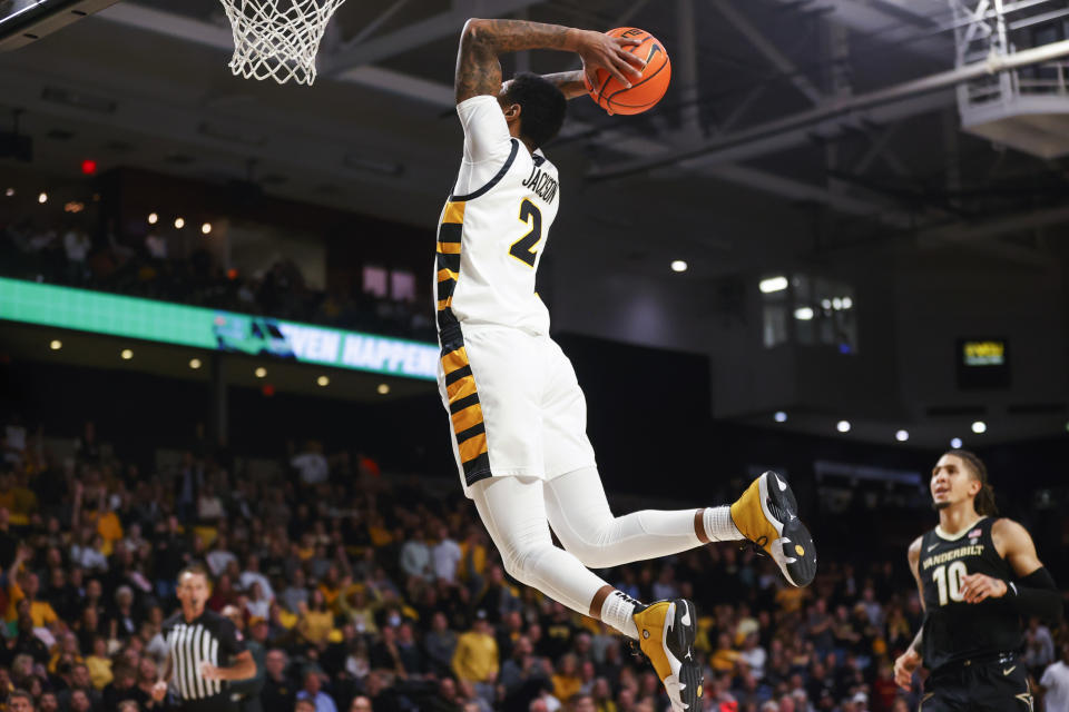 Virginia Commonwealth guard Zeb Jackson (2) dunks against Vanderbilt during the first half of an NCAA college basketball game Wednesday, Nov. 30, 2022, in Richmond, Va. (Shaban Athuman/Richmond Times-Dispatch via AP)