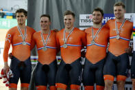 Cycling - UCI Track World Championships - Men's Team Sprint, Final - Hong Kong, China - 12/4/17 - Team members of the Netherlands celebrate with silver medals. REUTERS/Bobby Yip