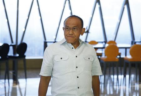 Indonesian President candidate from Golkar Party Aburizal Bakrie gestures during an interview in Jakarta, December 12, 2013. Picture taken December 12, 2013. REUTERS/Beawiharta