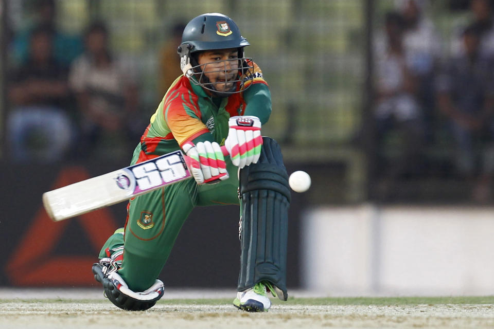 Bangladeshi cricketer Mushfiqur Rahim plays a shot during a warm-up cricket match against United Arab Emirates ahead of the Twenty20 World Cup Cricket in Fatullah, near Dhaka, Bangladesh, Wednesday, March 12, 2014. (AP Photo/A.M. Ahad)