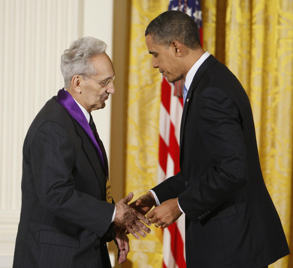 FILE - President Barack Obama presents artist Frank Stella with the 2009 National Medal of Arts, Feb. 25, 2010, in the East Room of the White House in Washington. Stella, a painter, sculptor and printmaker whose constantly evolving works are hailed as landmarks of the minimalist and post-painterly abstraction art movements, died Saturday, May 4, 2024, at his home in Manhattan. He was 87. (AP Photo/Charles Dharapak, File)