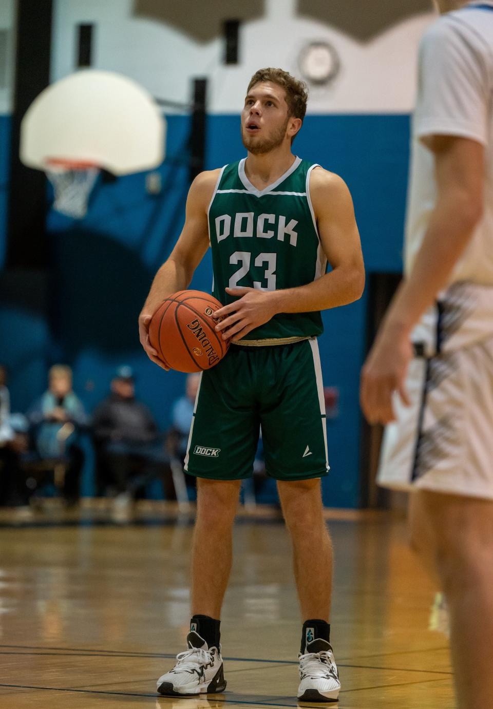 Dock Mennonite senior Nate Lapp prepares to shoot a free throw against North Penn.