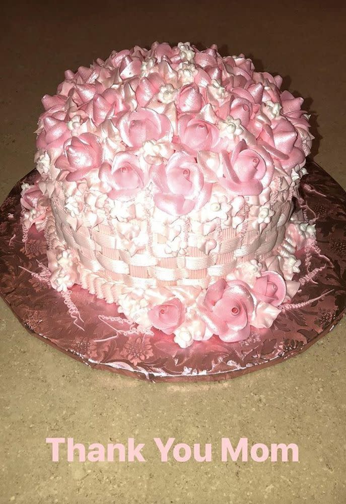 Kim Kardashian West celebrated the birth of her third child with a pink rose cake from her mother Kris Jenner.