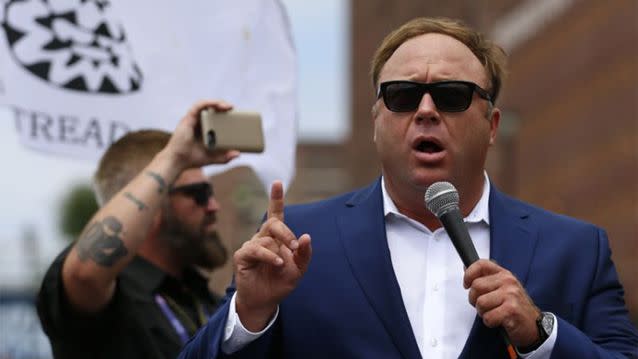 Conspiracy theorist and prominent conservative radio host Alex Jones has since apologised for promoting the 'Pizzagate' theory. Photo: Yahoo US