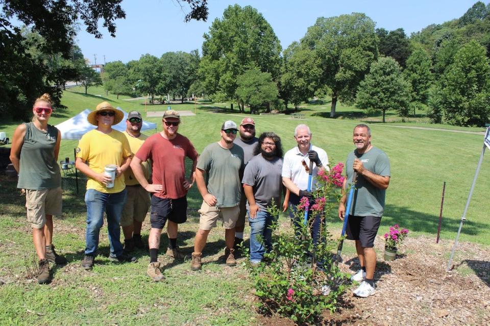 Shown from left are: Sarah Birk, Clarksville Parks & Recreation Grounds and Facilities (G and F) Maintenance Tech; Taylor Deffendal, G and F Maintenance Assistant; Dewane Rittenberry, G and F Tech; Dustin Schwartz, G and F Assistant; Hunter Lindsey, G and F Tech; Timothy Richard, G and F Assistant; Alfredo Magana, G and F Assistant; Clarksville Mayor Joe Pitts; and Randall Kelly, Parks & Rec Deputy Director of Operations.