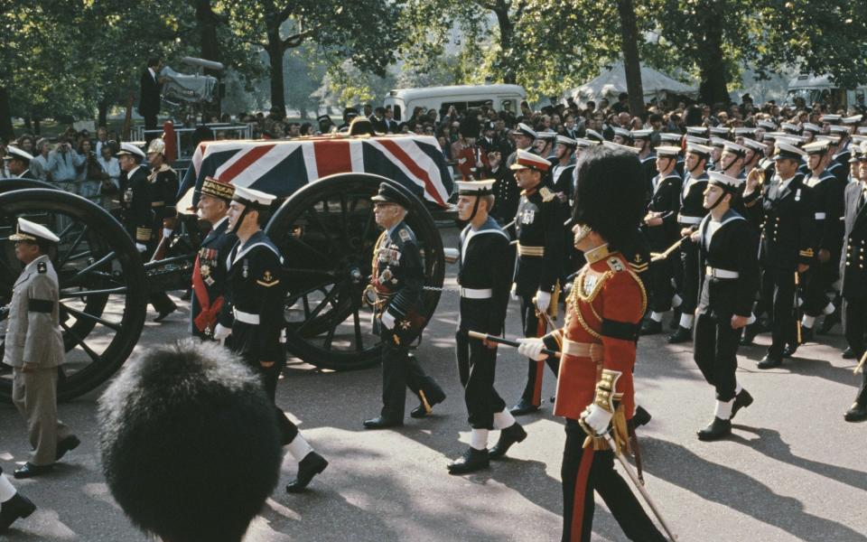 The coffin of Lord Louis Mountbatten is carried through London on a gun carriage accompanied by Royal Navy ratings - Keystone/Hulton Archive