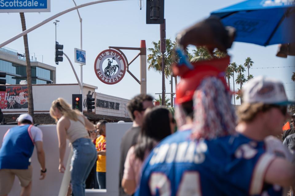 Super Bowl fans walk around Old Town Scottsdale on Feb. 11, 2023.