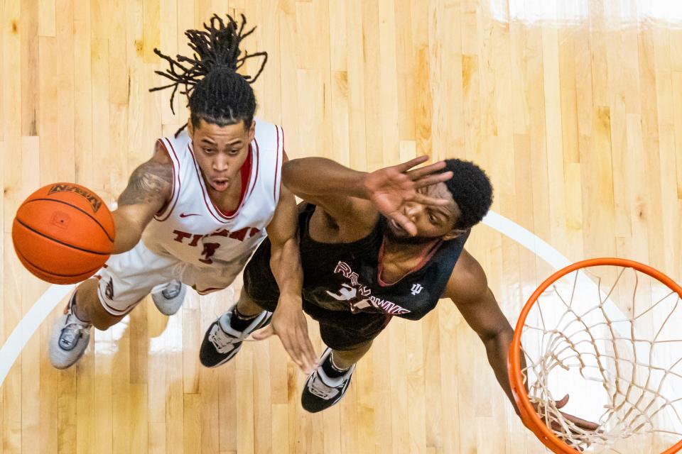 IUSB's Donyell Meredith II (3) drives to the basket during the Indiana University South Bend vs. Indiana University Northwest basketball game Wednesday Feb. 15, 2023 in the Student Activities Center on campus at IUSB. (Photo by Michael Caterina/Indiana University South Bend)