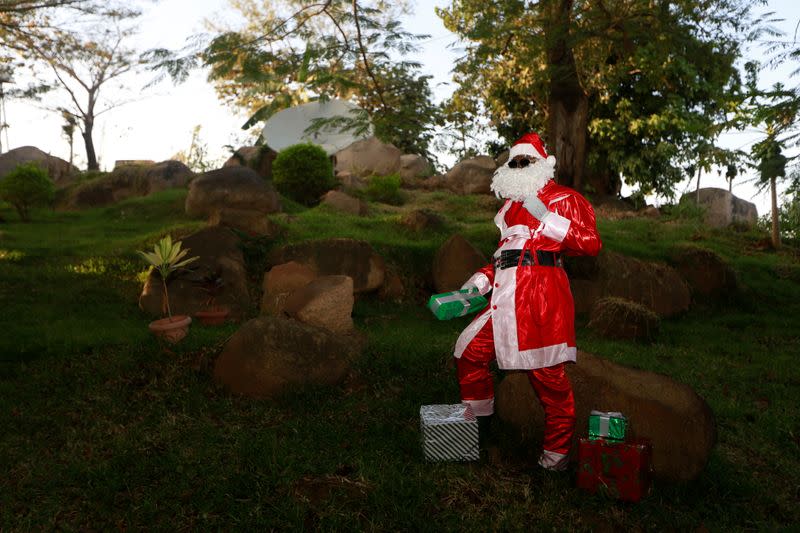 The Wider Image: Christmas wishes from Santas around the world