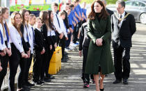 <p>Though she has access to all the clothes in the world, Kate notoriously recycles many of her outfits and did just that during a day trip to Scotland. She wore a dark green, knee-length coat from Sportmax, one that she previously donned at previous Christmas festivities. Under the coat she rocked a houndstooth skirt from the brand Le Kilt.</p>