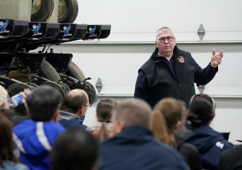 Duane Stateler speaks to a visiting group about the data collected from an edge-of-field testing system that is in use on his Hancock County farm.