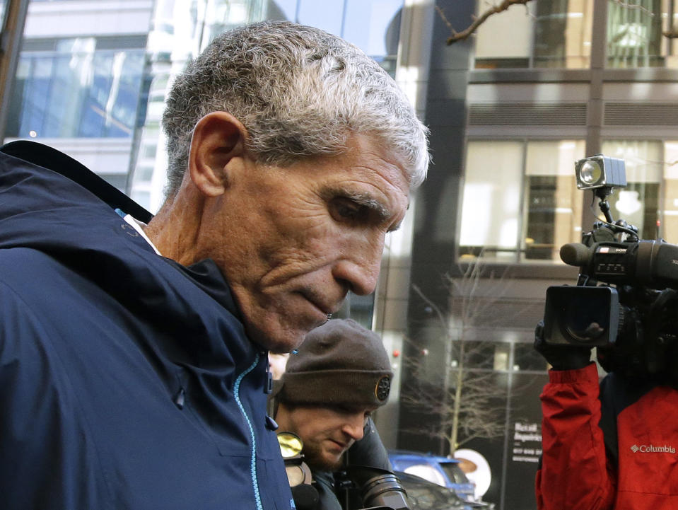  William "Rick" Singer founder of the Edge College & Career Network, departs federal court in Boston on Tuesday, March 12, 2019, after he pleaded guilty to charges in a nationwide college admissions bribery scandal. (AP Photo/Steven Senne)        