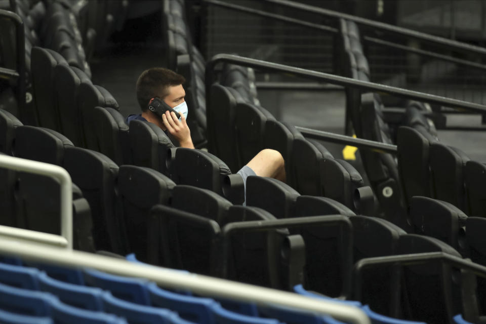 Tampa Bay Rays general manager Erik Neander watches baseball practice, Wednesday, July 8, 2020, in St. Petersburg, Fla. (AP Photo/Mike Carlson)