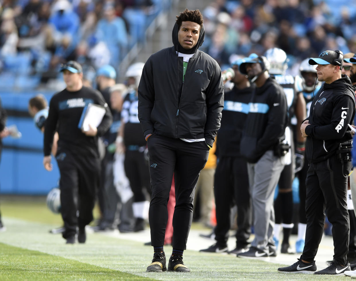 Cam Newton spent the last two games of the Panthers’ season on the sideline. (AP Photo/Mike McCarn)