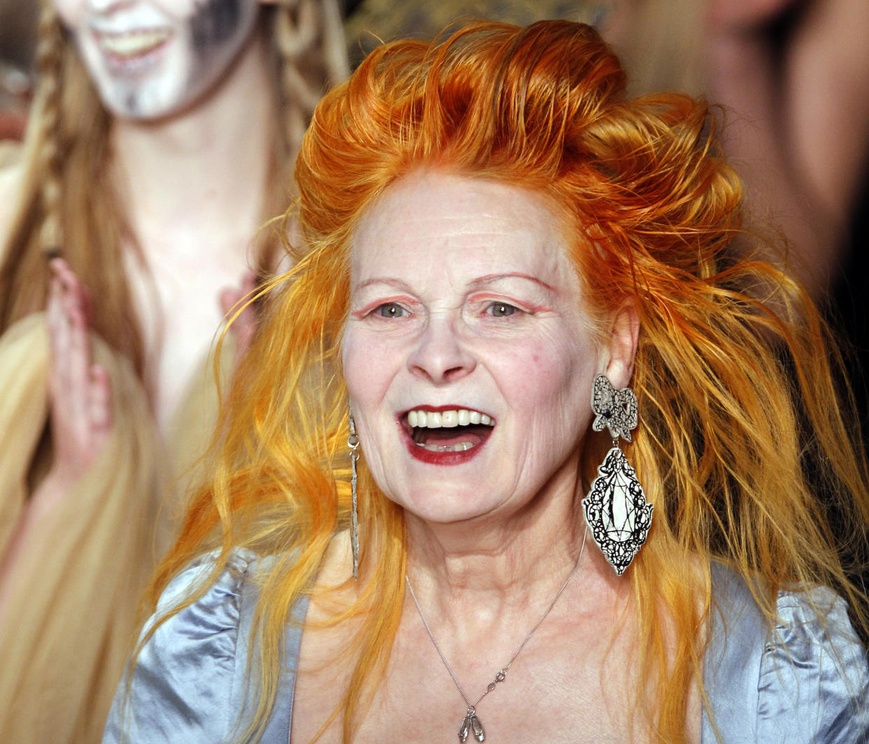 British designer Vivienne Westwood acknowledges the public following the Autumn/Winter 2011-2012 ready-to-wear collection show on March 4, 2011 in Paris. (Photo: AFP /Patrick Kovarik)