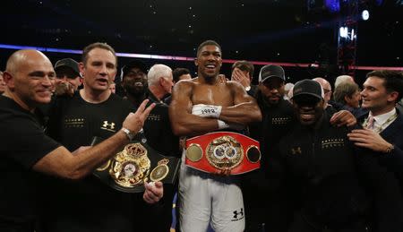 Britain Boxing - Anthony Joshua v Wladimir Klitschko IBF, IBO & WBA Super World Heavyweight Title's - Wembley Stadium, London, England - 29/4/17 Anthony Joshua celebrates with trainer Robert McCracken and his corner after winning the fight Action Images via Reuters / Andrew Couldridge Livepic