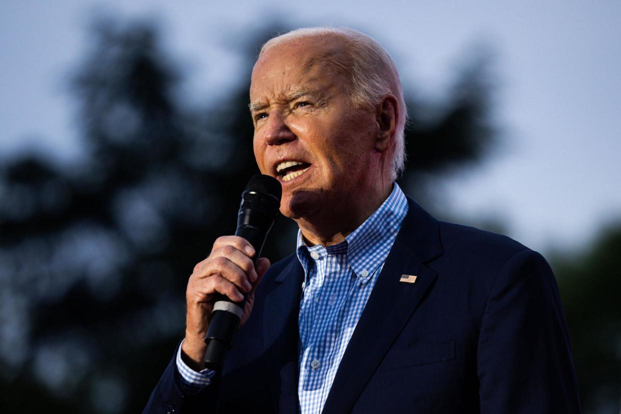 <span>Joe Biden speaks at the White House in Washington DC on 4 July 2024.</span><span>Photograph: REX/Shutterstock</span>