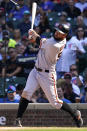 San Francisco Giants' Brandon Belt hits a two-run home run during the seventh inning of a baseball game against the Chicago Cubs in Chicago, Friday, Sept. 10, 2021. (AP Photo/Nam Y. Huh)