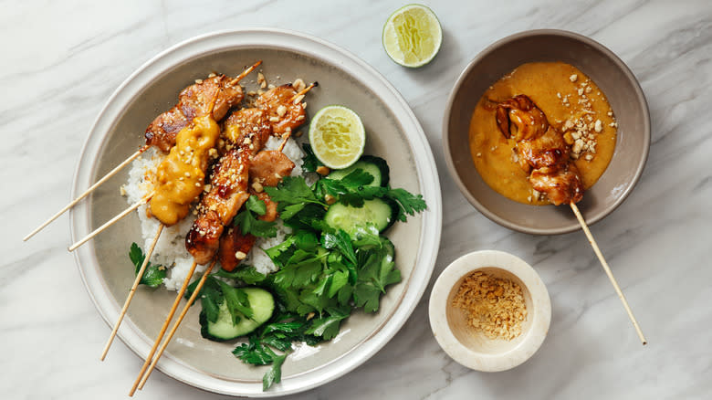 Grilled skewers with peanut sauce