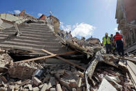 <p>Rescuers search for survivors amidst the rubble following an earthquake, in Amatrice, central Italy, Wednesday, Aug. 24, 2016. (AP Photo/Alessandra Tarantino) </p>