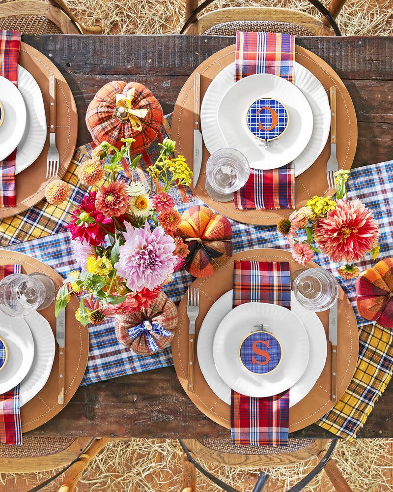 <p>Your table will look rad in plaid if you choose coordinating tartan prints for your table runners, napkins, vases, and pumpkin ribbons.</p><p><a class="link " href="https://www.amazon.com/BETTERLINE-Oversized-Farmhouse-Christmas-Thanksgiving/dp/B07VWSB114?tag=syn-yahoo-20&ascsubtag=%5Bartid%7C10070.g.23289609%5Bsrc%7Cyahoo-us" rel="nofollow noopener" target="_blank" data-ylk="slk:SHOP PLAID NAPKINS;elm:context_link;itc:0;sec:content-canvas">SHOP PLAID NAPKINS</a></p>