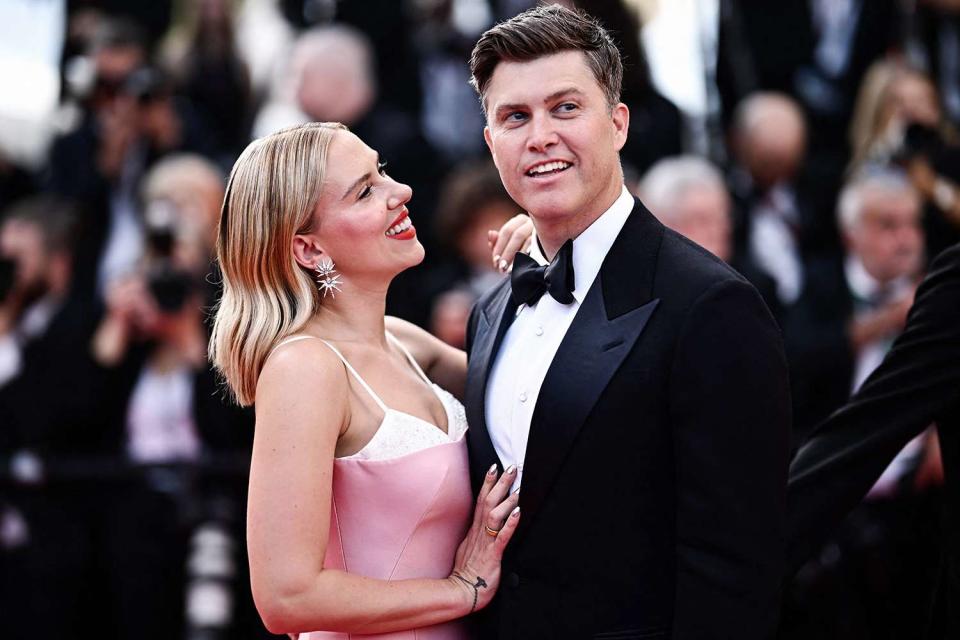 <p>LOIC VENANCE/AFP/Getty</p> Scarlett Johansson and Colin Jost 