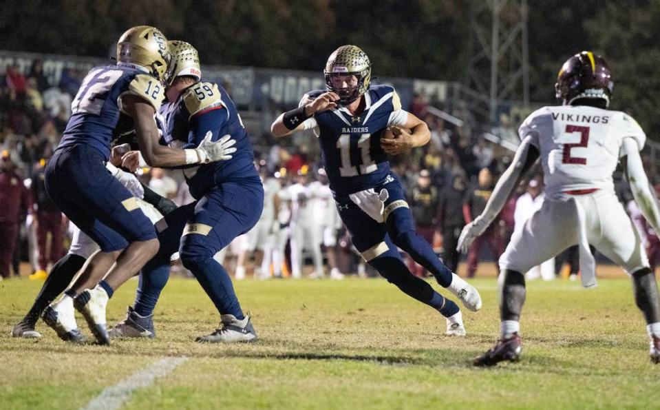 Central Catholic quarterback Tyler Wentworth runs in for a touchdown during the Sac-Joaquin Section Division I quarterfinal game with Edison at Central Catholic High School in Modesto, Calif., Friday, Nov. 10, 2023. Central Catholic won the game 34-20.