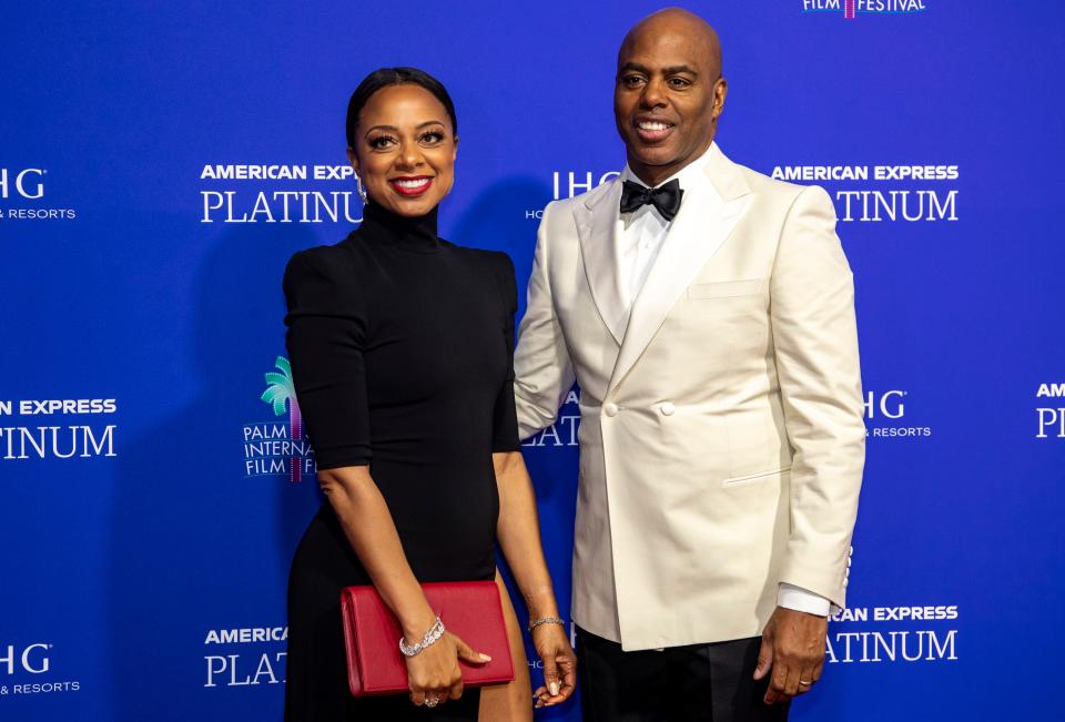 Hosts Nischelle Turner Kevin Frazier pose together on the red carpet at the Palm Springs International Film Awards in Palm Springs, Calif., Thursday, Jan. 5, 2023. 