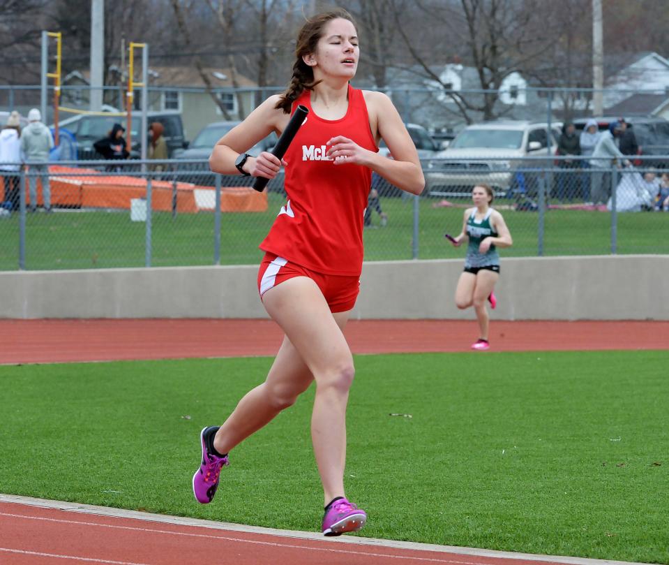 General McLane High School junior Jenna Preston extends a lead in the 3,200-meter relay during the Harbor Creek track and field invitational at Paul J. Weitz Stadium in Harborcreek Township on Saturday.