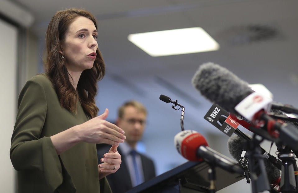 New Zealand Prime Minister Jacinda Ardern addresses a press conference on the latest COVID-19 updates in Auckland, New Zealand, Monday, Sept. 21, 2020. All remaining virus restrictions will be lifted across much of New Zealand from late Monday, with the exception of the largest city, Auckland, which will continue to have some restrictions for at least another 16 days. (Greg Bowker/NZ Herald via AP)