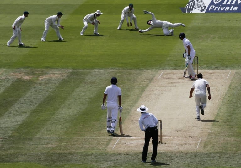 Peter Nevill (top right) dives to try to catch a shot by England's Jos Buttler at Lord's on July 18, 2015