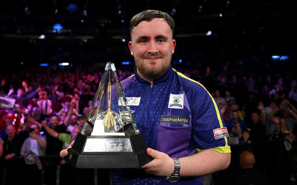 Luke Littler silences his critics with nine-darter on way to Premier League title win