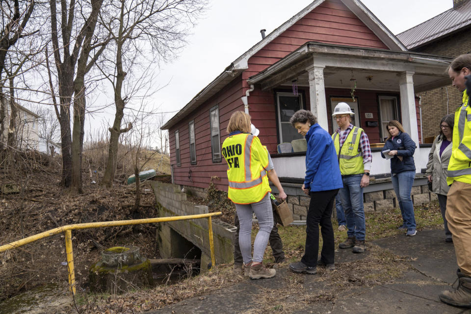 Ohio EPA officials tour the damage in East Palestine, Ohio (Lucy Schaly / Pittsburgh Post-Gazette via AP file)