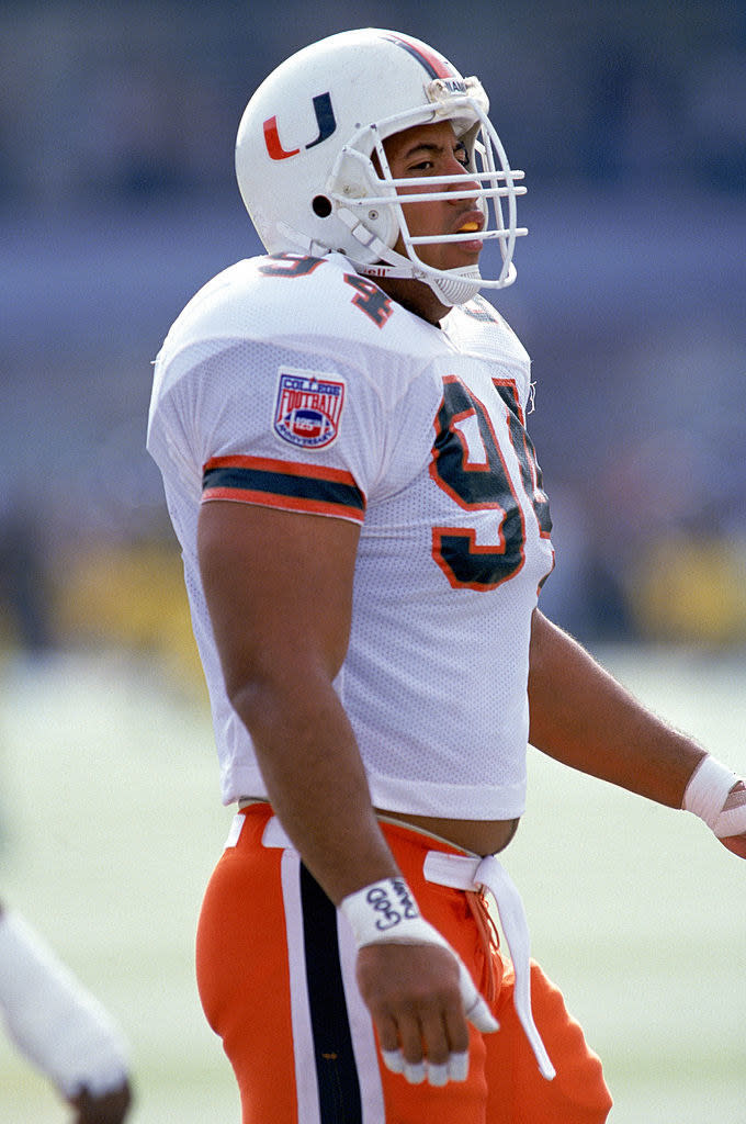 He played college football at the University of Miami.