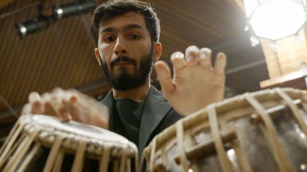 PHOTO: Hamid Khpolwak is playing the tabla, a traditional Afghan instrument, during a charity concert on Capitol Hill in Washington, D.C., to benefit Afghan refugees in America. (ABC News)