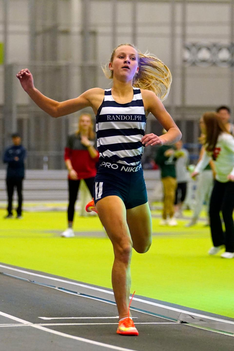 Carlie Wysocki of Randolph finishes first in the 1000-meter race during the Morris County winter track championships at the Ocean Breeze Athletic Complex in Staten Island on Jan. 30, 2023.