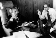 In this June 25, 1974, photo released by the White House, President Richard Nixon listens to his Secretary of State Dr. Henry Kissinger aboard the plane that brought the U.S. president to Belgium. Within two months Nixon had resigned, and in June 1975, the feisty ex-President defended his shredded legacy and shady Watergate-era actions in grand jury testimony that he thought would never come out. On Thursday, Nov. 10, 2011, it did. (AP Photo/White House Photo, Ollie Akins)