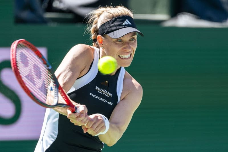 German tennis player Angelique Kerber in action against Croatian Petra Martic during their women's singles first round match of the Indian Wells Open tennis tournament. Maximilian Haupt/dpa