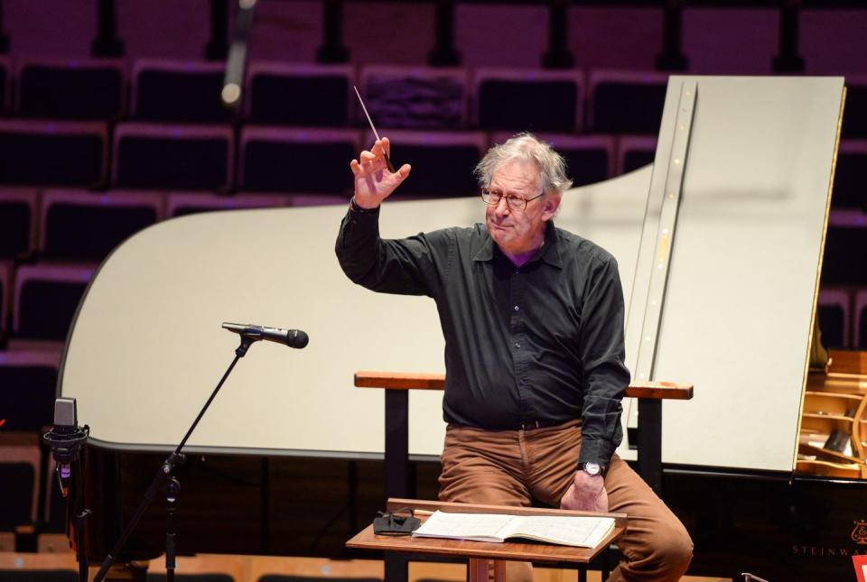 poole, england february 23 conductor sir john eliot gardiner rehearses on stage on february 23, 2021 in poole, england bournemouth symphony orchestra returns in full to the stage at lighthouse, poole with conductor sir john eliot gardiner and pianist stephen hough their concert broadcasts live via bsolivecom on wednesday photo by finnbarr webstergetty images