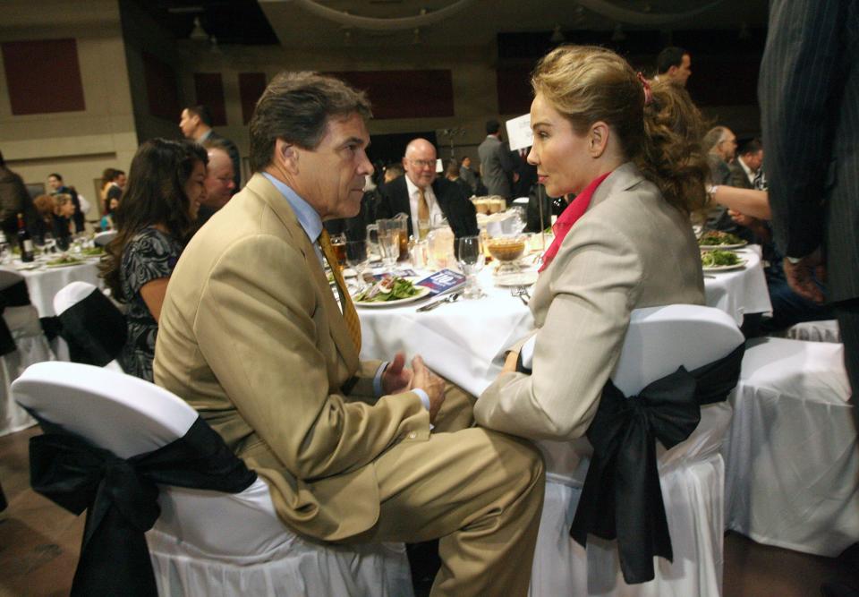 Former gov. Rick Perry speaks with Laura Lynch on Friday, Oct. 9, 2009, shortly after arriving a the Greater El Paso Chamber of Commerce Gala at the Judson F. Williams Convention Center in El Paso, Texas, where Perry was the keynote speaker.