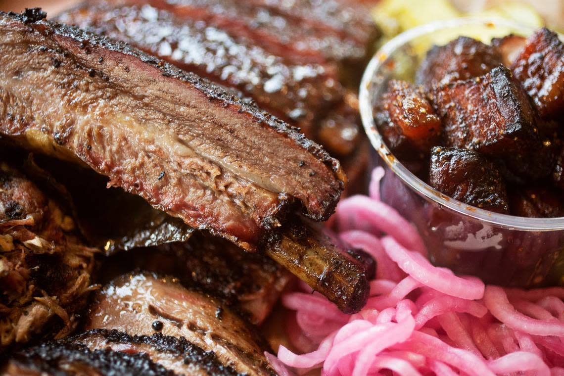 Jon Gs Barbecue serves ribs, brisket, pulled pork, turkey and house-made sausage links along with burnt ends and house-made pickles.