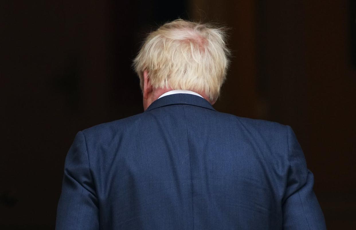 <span class="caption">Will Boris Johnson be back? The chances may be slim.</span> <span class="attribution"><a class="link " href="https://www.gettyimages.com/detail/news-photo/prime-minister-boris-johnson-returns-inside-after-news-photo/1407301546?adppopup=true" rel="nofollow noopener" target="_blank" data-ylk="slk:Carl Court/Getty Images;elm:context_link;itc:0;sec:content-canvas">Carl Court/Getty Images</a></span>
