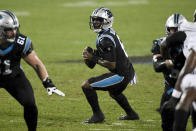 Carolina Panthers quarterback P.J. Walker looks to pass against the Atlanta Falcons during the second of an NFL football game Thursday, Oct. 29, 2020, in Charlotte, N.C. (AP Photo/Mike McCarn)