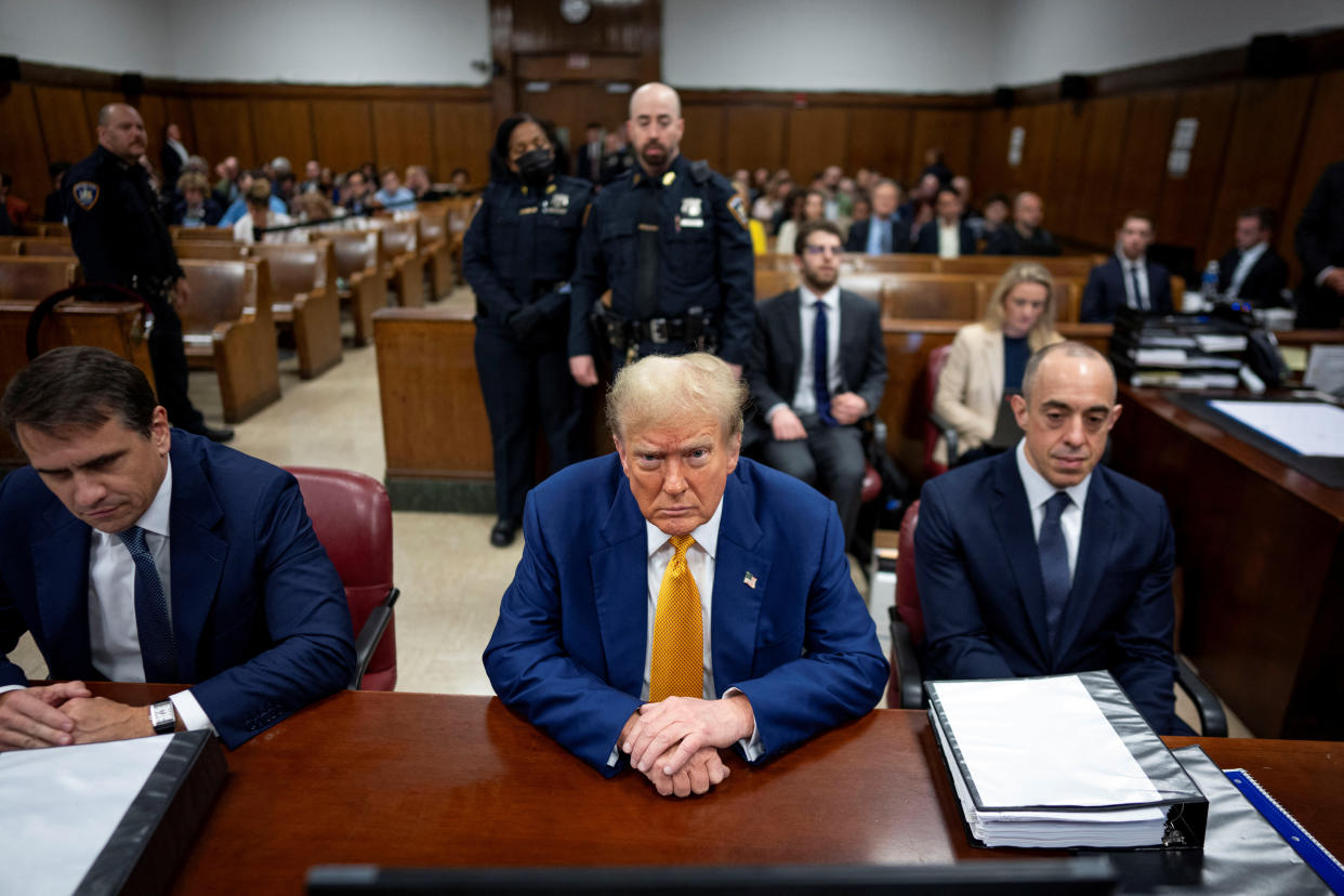 Former President Donald Trump, center, at his criminal trial in Manhattan on Thursday, May 2, 2024.   (Doug Mills/The New York Times)