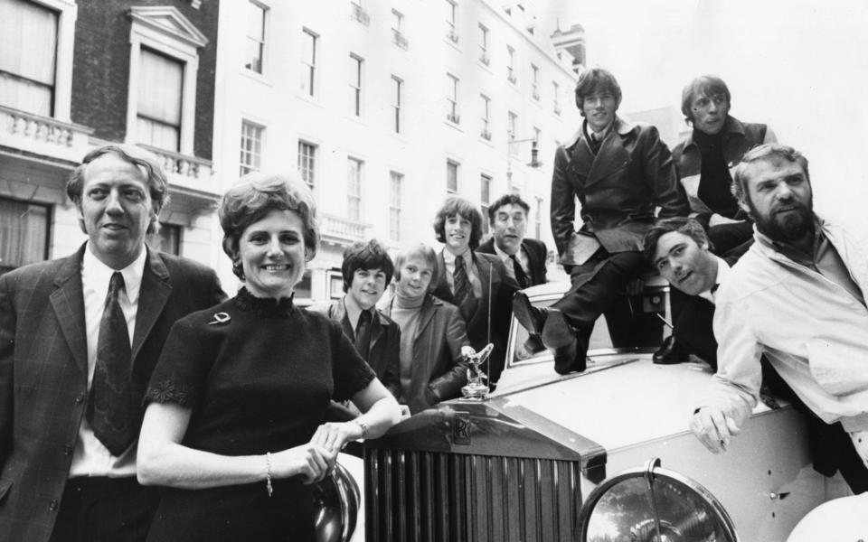 Beryl Vertue in 1968 celebrating the merger of ALS and RSO, with, among others, Robert Stigwood (far left), Frankie Howerd, the Bee Gees, and Alan Simpson and Ray Galton (far right) - Jim Gray/Keystone/Getty Images