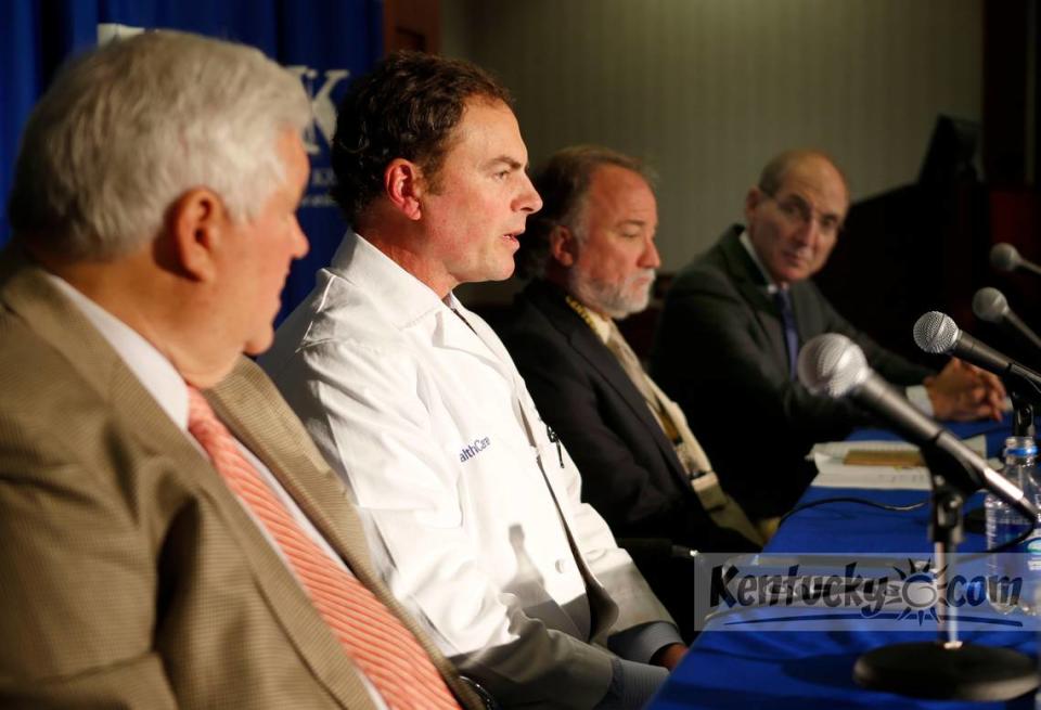 L-R: Rodney Parsons-Parkin’s Disease patient, Dr. Craig van Horne-UK assistant professor of neurosurgery and principle investigator of the clinical trial, Dr. Greg Gerhardt-UK professor of anatomy & neurobiology and director of the Morris K. Udall Parkinson’s Disease Research Center of Excellence, Eli Capilouto- UK president, during a morning news conference concerning the University of Kentucky’s trial of a promising new treatment strategy for Parkinson’s Disease, held in the Charles Wethington Building on the UK campus in Lexington, Ky., Monday, November, 18, 2013. UK is the first in the U.S. to conduct a clinical trial to investigate the new treatment strategy. Photo by Charles Bertram | Staff